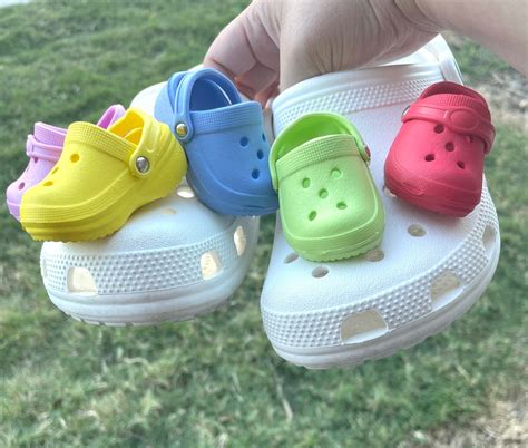 what are crocs charms called